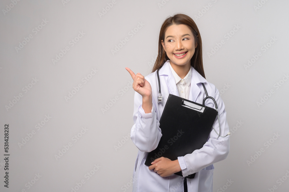 Portrait of female confident doctor over white background studio, healthcare and Medical technology concept. Portrait of female confident doctor over white background studio, healthcare and Medical technology concept.