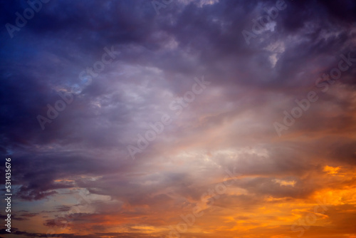 Beautiful bright multicolored sunset sky with yellow and pink hues, natural abstract background