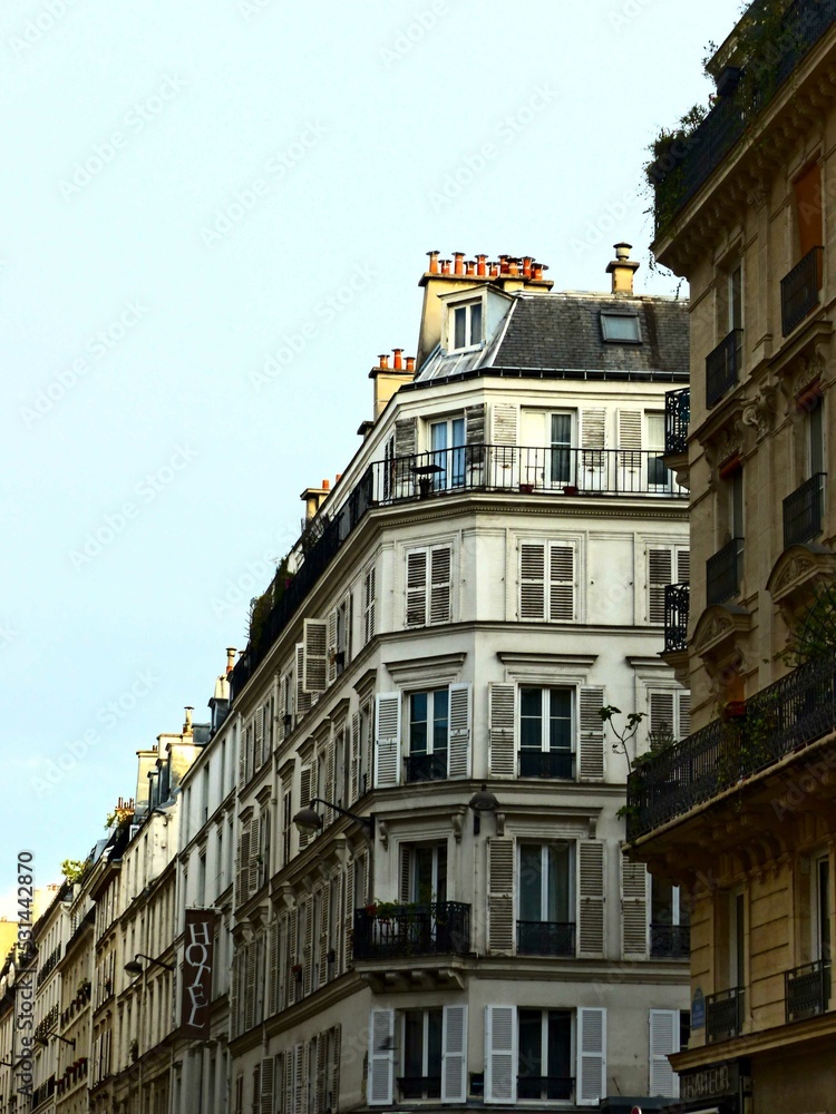 Paris, September 2022 : Visit of the magnificent city of Paris, Capital of France - View on different facades of buildings built by Baron Haussmann