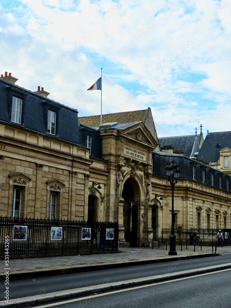 Obraz premium Paris, September 2022 : Visit of the magnificent city of Paris, Capital of France - View on different facades of buildings built by Baron Haussmann