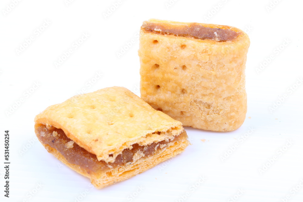 Butter cracker with pineapple jam isolated on the white background