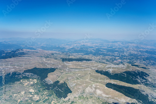 wind farm on barren hills near Macchiagodena, aerial, Italy