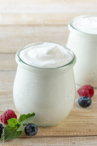 fresh greek yogurt in glass jar