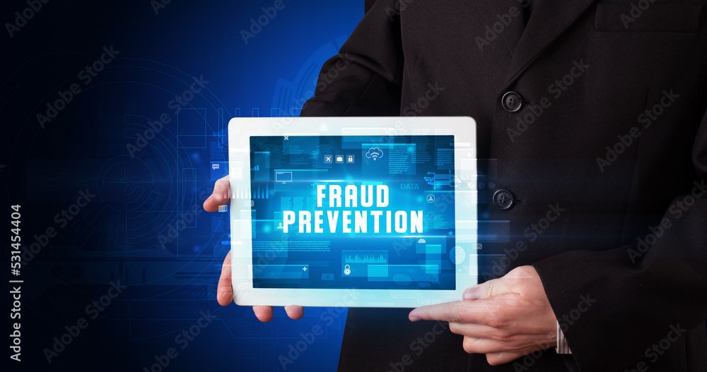 Person holding tablet, security concept Person holding tablet, security concept
