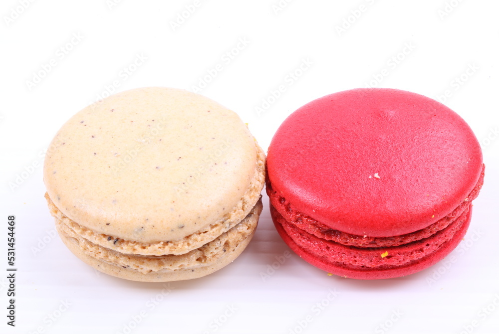Red and cream macaron isolated in white background Red and cream macaron isolated in white background