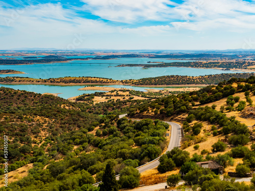 Impressive view of Alqueva lake, artificial bassin that impounds the River Guadiana, on the border of Beja and Evora Districts in the south of Portugal
 photo
