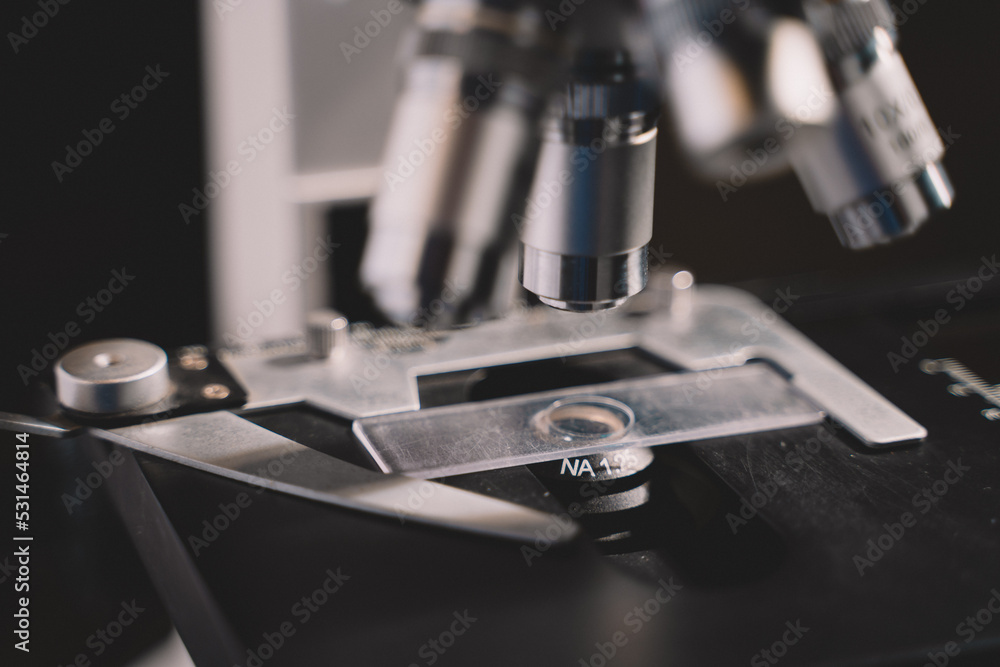 Microscope in laboratory science closeup research. Laboratory of biology by biotechnology for analysis, experiment, education and test. Microscope in laboratory science closeup research. Laboratory of biology by biotechnology for analysis, experiment, education and test.