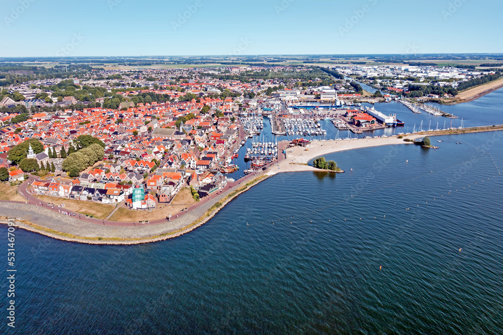Fototapeta premium Aerial from the traditional town Urk and the harbor in the Netherlands