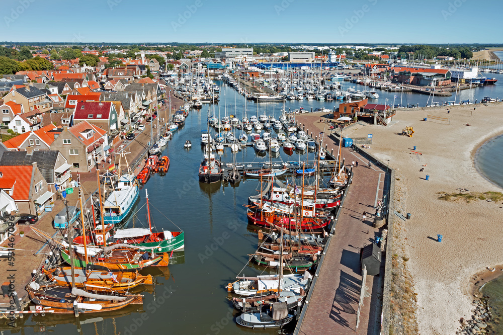 Aerial from the traditional town Urk and the harbor in the Netherlands - obrazy, fototapety, plakaty 