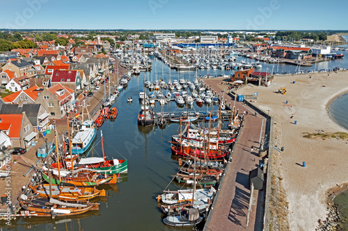 Aerial from the traditional town Urk and the harbor in the Netherlands photo