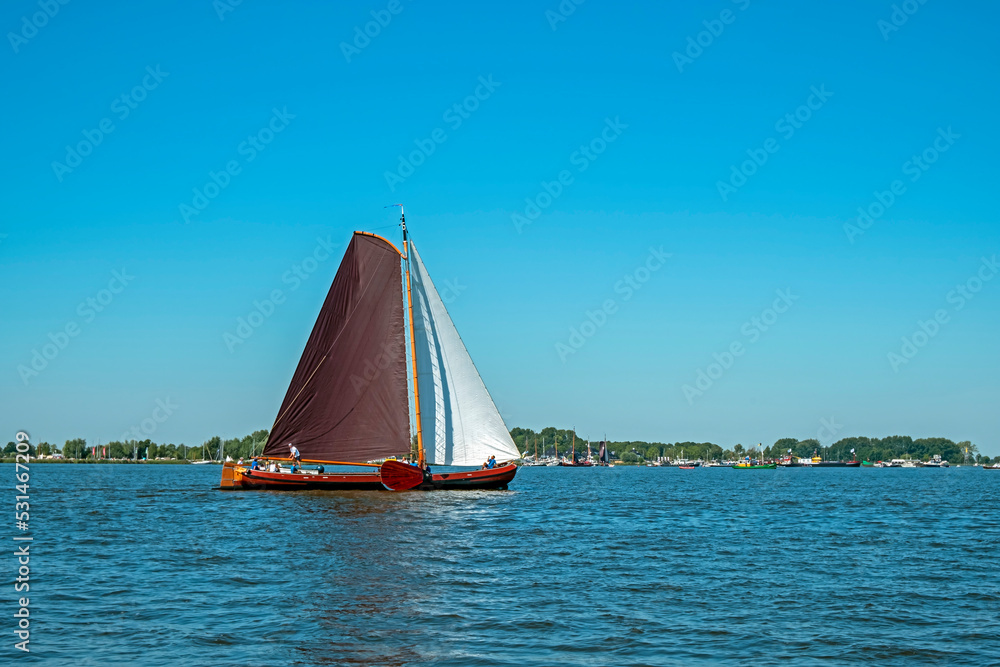 Fototapeta premium Traditional Frisian wooden sailing ship in a yearly competition in the Netherlands