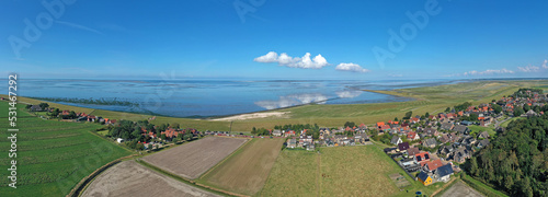 Aerial panorama from the traditional village Moddergat at the Wadden Sea in Friesland the Netherlands photo