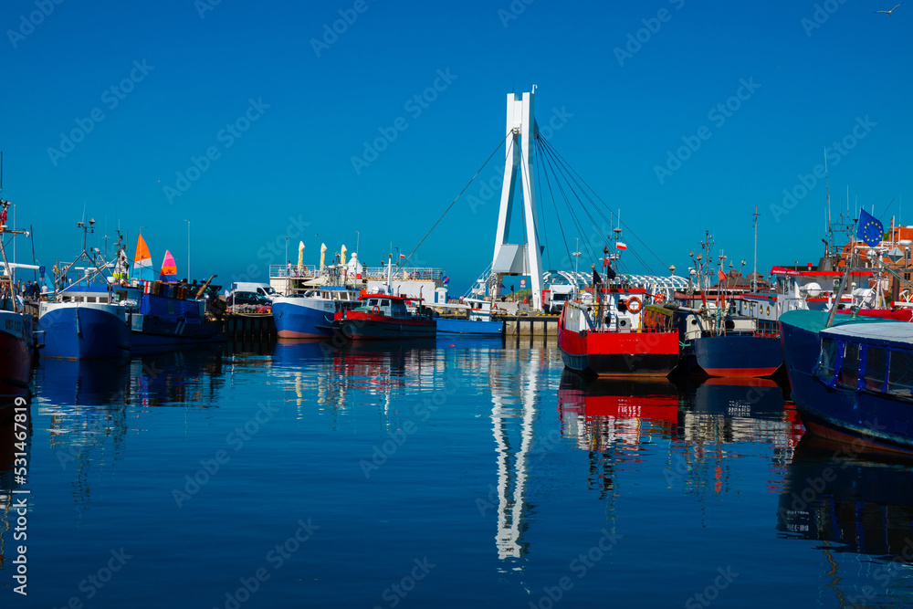 2022-06-02 view of harbor with yachts at mouth of slupia. baltic sea, ustka, poland
