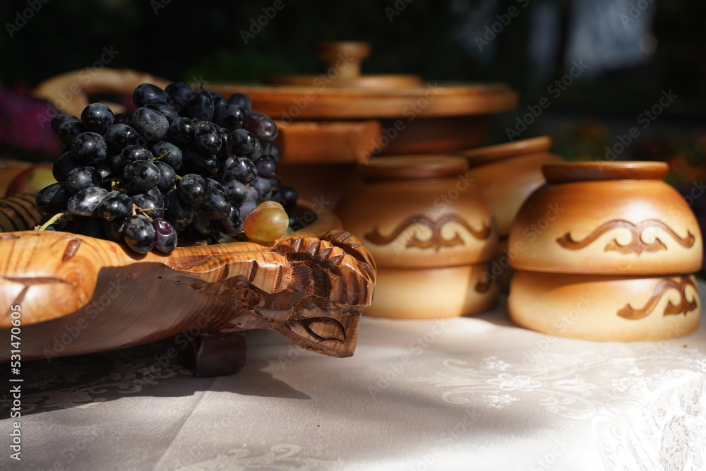 Wooden carved tableware with Kazakh national pattern Wooden carved tableware with Kazakh national pattern