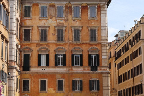 Piazza di Pietra Square Orange Brown Traditional Building Facades in Rome, Italy