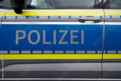 Typical police vehicle in Germany with Blue Lettering - translation: Polizei.