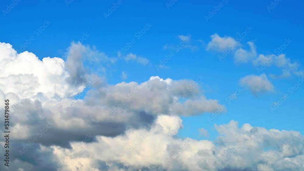 White clouds floating in the sunny sky White clouds floating in the sunny sky