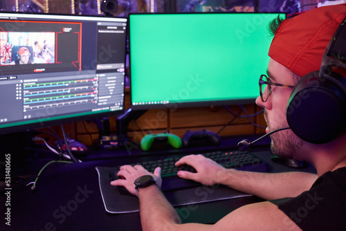 Young man editing the information of the stream