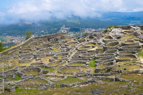 Archaeological ruins of Castro of Santa Trega on hillside, A Guarda, Pontevedra, Galicia, Spain photo