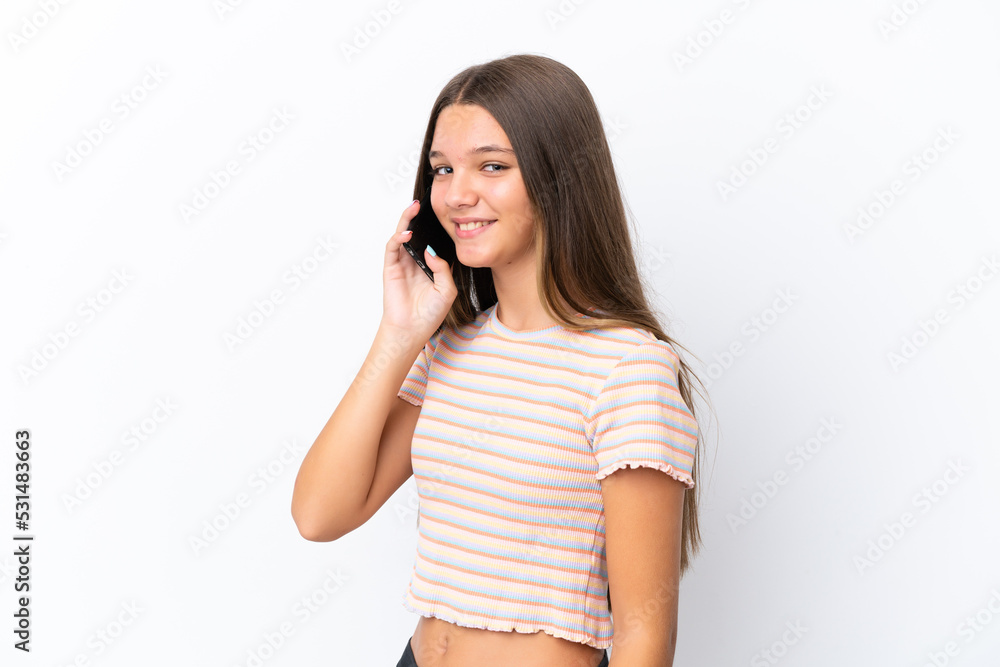 Little caucasian girl isolated on white background keeping a conversation with the mobile phone Little caucasian girl isolated on white background keeping a conversation with the mobile phone