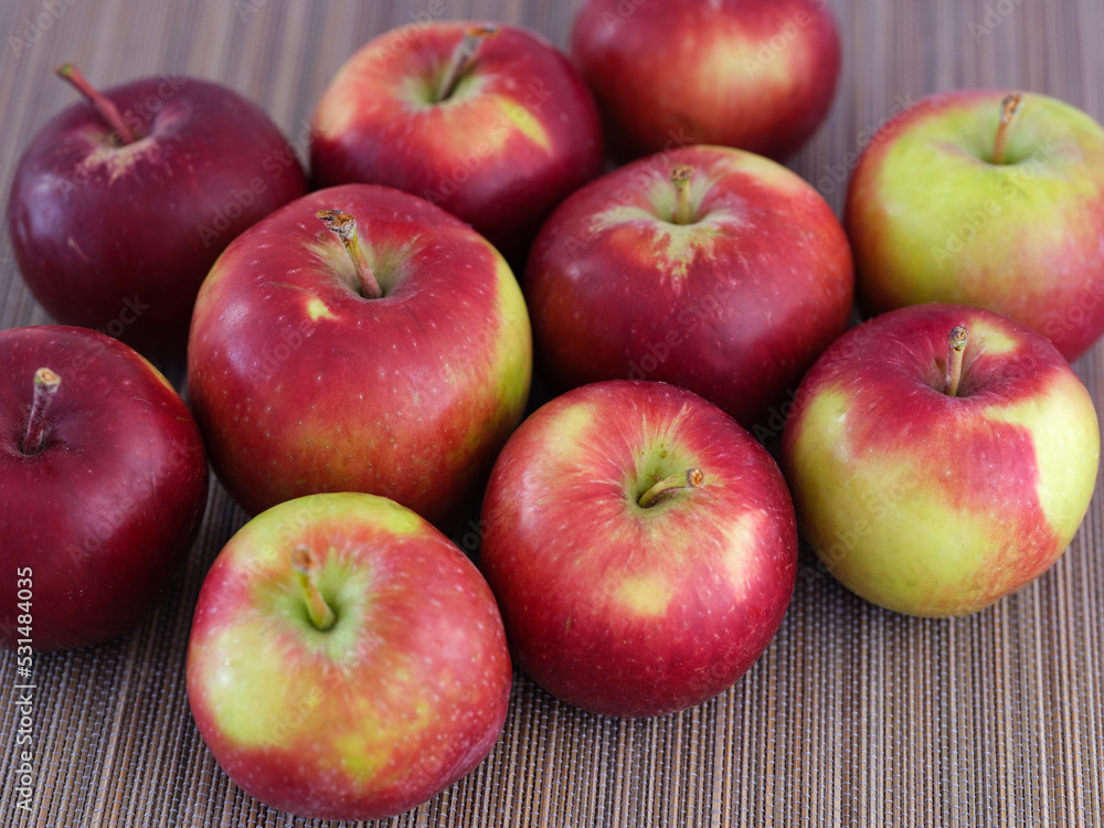 Some fresh organic apples on bamboo napkin Some fresh organic apples on bamboo napkin