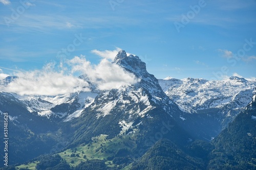 Murtschenstock above Walensee in the canton of Glarus. Fantastic view of the snow covered mountain. Photo from Amden St.Gallen. Muertschenstock. High quality photo