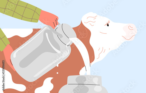 Farmer pours freshly milked milk