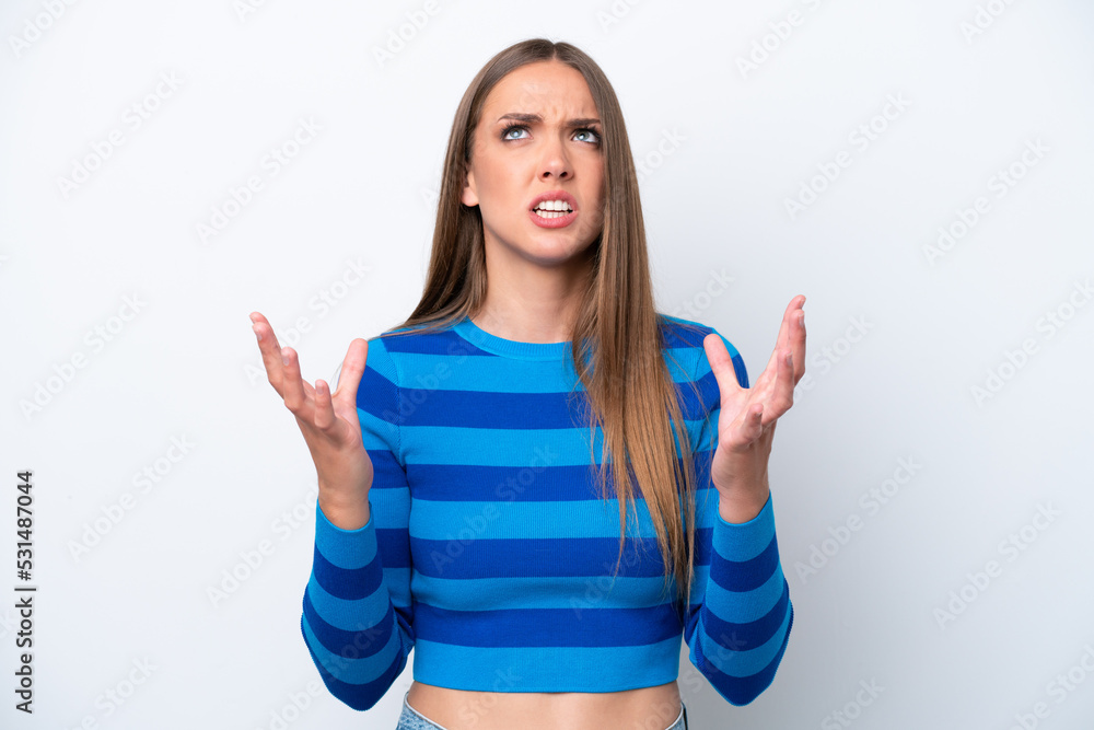 Fototapeta premium Young caucasian woman isolated on white background stressed overwhelmed