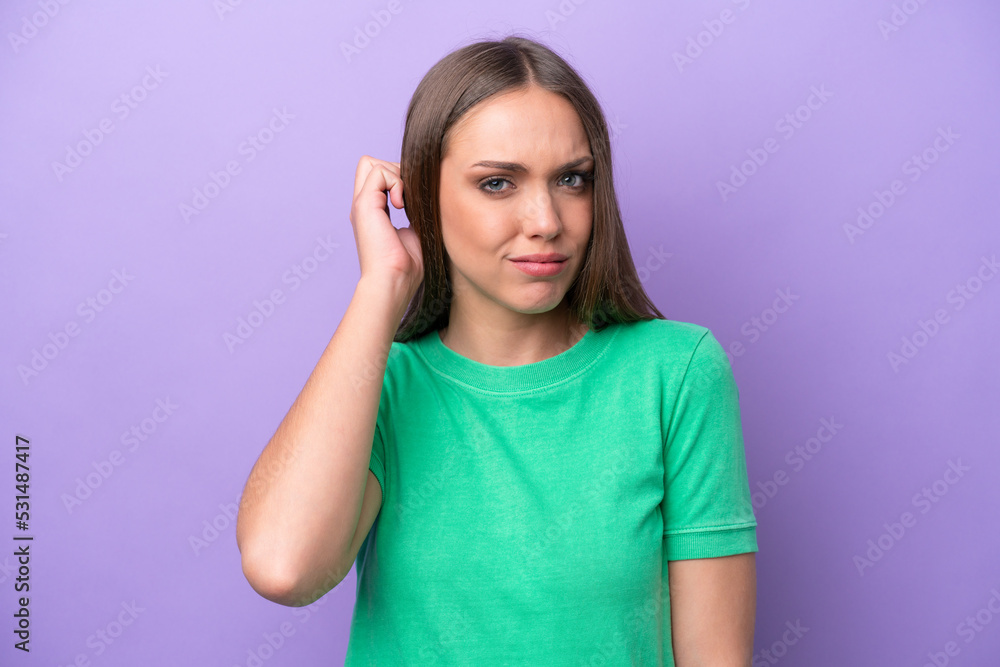 Young caucasian woman isolated on purple background having doubts Young caucasian woman isolated on purple background having doubts