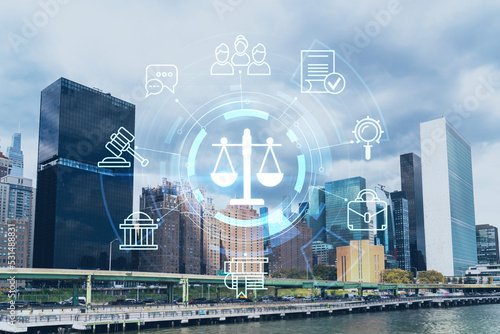 New York City skyline, United Nation headquarters over the East River, Manhattan, Midtown at day time, NYC, USA. Glowing hologram legal icons. The concept of law, order, regulations, digital justice