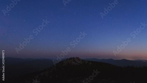 Wallpaper Mural Moon setting behind the mountains and Milky Way appears in the night sky time lapse footage Torontodigital.ca