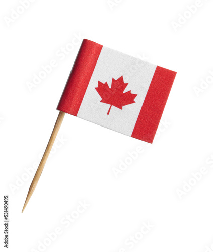 Foto Small paper flag of Canada isolated on white