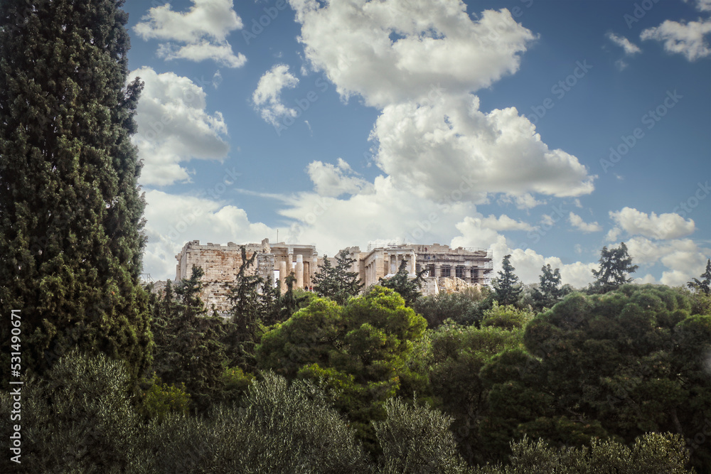View of Parthenon over trees - View from Plaka with evergreen framing picture - Room for copy