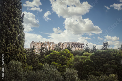 View of Parthenon over trees - View from Plaka with evergreen framing picture - Room for copy