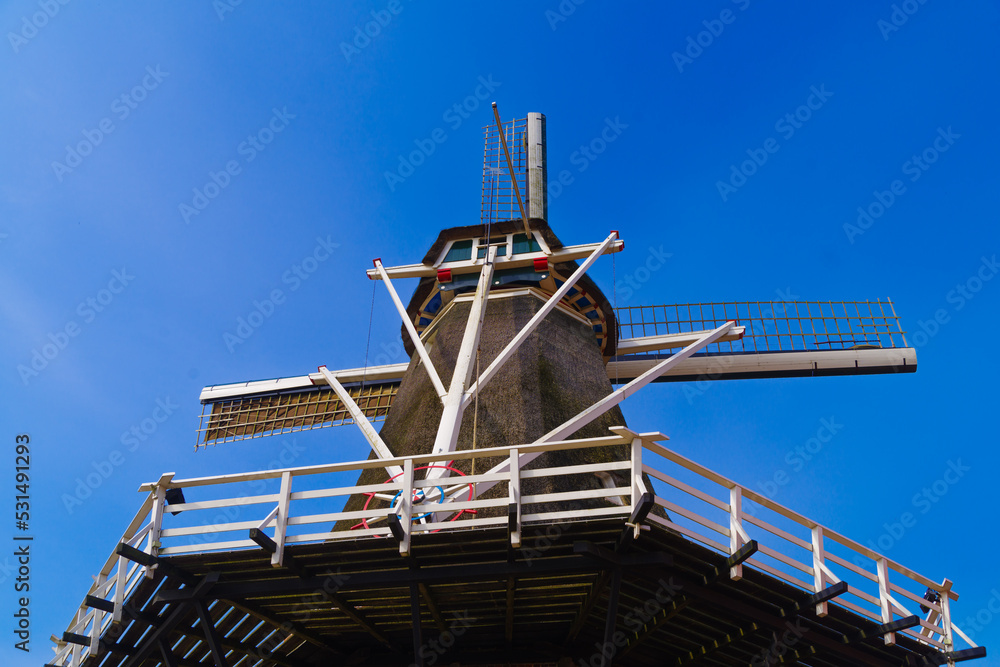 dutch windmill against blue sky