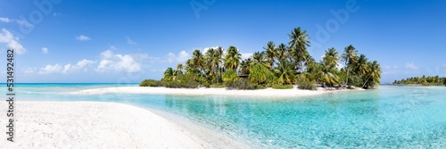 Blue lagoon on reef island, Rangiroa atoll, French Polynesia