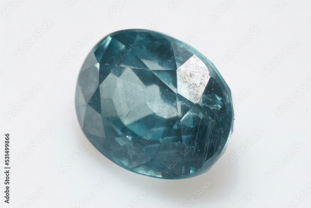 Natural gemstone blue zircon on background Natural gemstone blue zircon on background