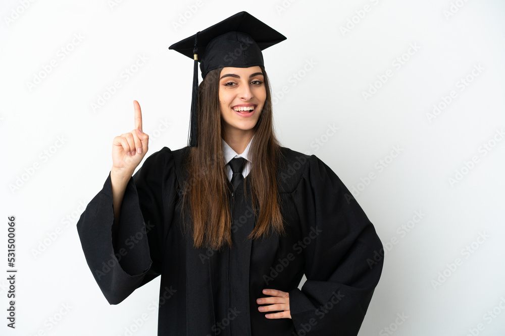 Young university graduate isolated on white background showing and lifting a finger in sign of the best Young university graduate isolated on white background showing and lifting a finger in sign of the best