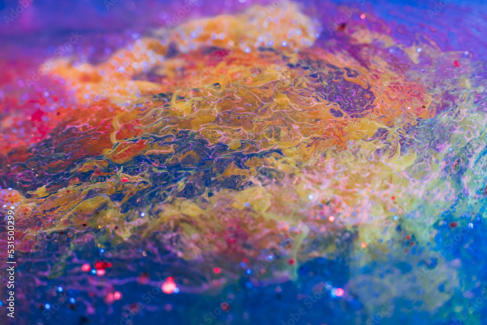 Water glitter pollution. Microplastic danger. Colorful toxic waste