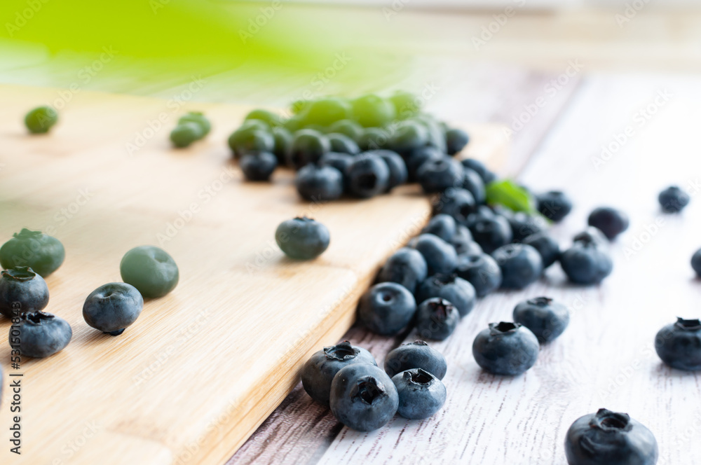 Fresh blueberries scattered on the surface. selective focus