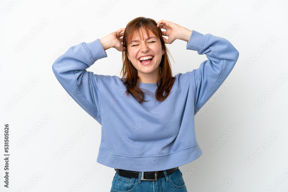 Redhead girl isolated on white background laughing Redhead girl isolated on white background laughing