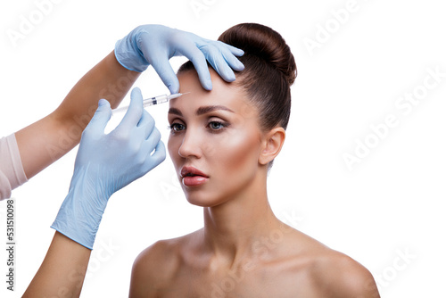 Beautiful woman gets injections. Cosmetology. Beauty Face, doctor's hands in the frame photo