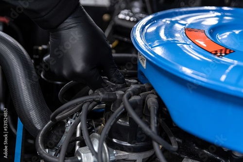 Ignition apparatus and air filter in a classic car. Car care