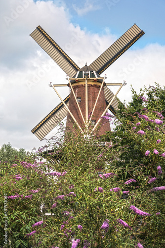 Central city of Utrecht in Netherlands with the view on windmill in Utrecht city. 