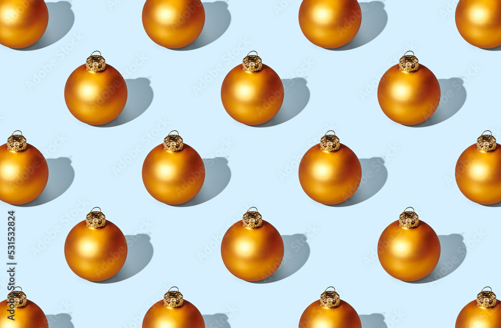 Pattern of christmas balls on blue pastel background Pattern of christmas balls on blue pastel background