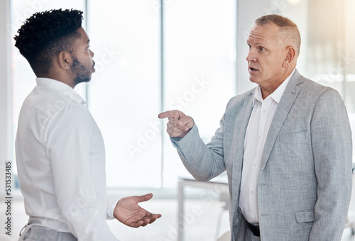 Angry businessman executive and finger pointing for conflict mistake or KPI fail. Corporate boss, ceo or manager unhappy, frustrated or stress fight with employee for bad job or career review results