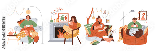 Set of smiling girls in warm clothes resting in armchairs, holding cups of warm drink