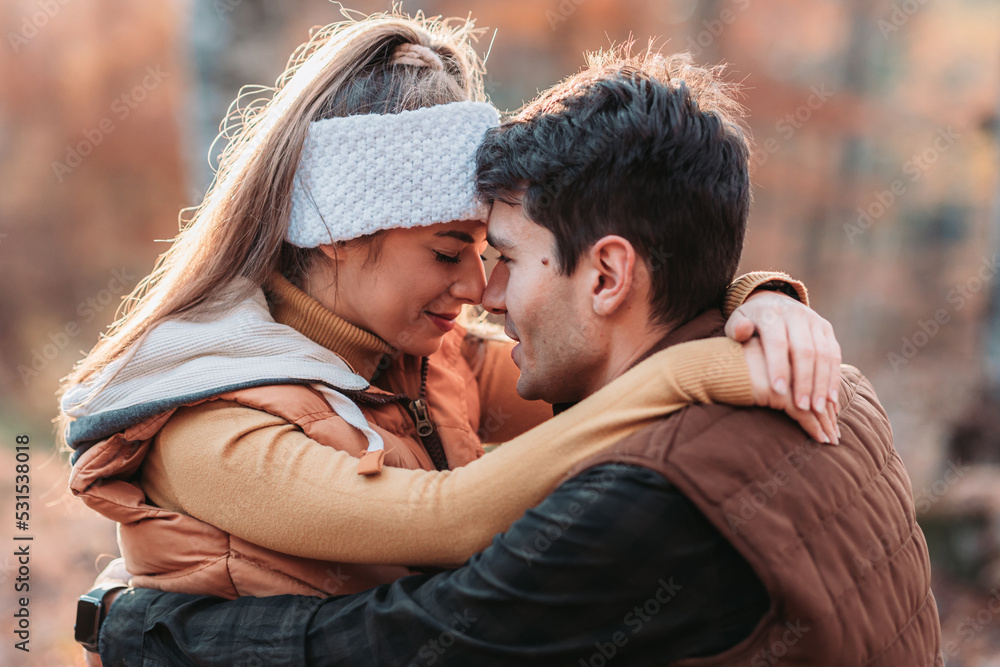 Young couple hugging tightly in the woods Young couple hugging tightly in the woods