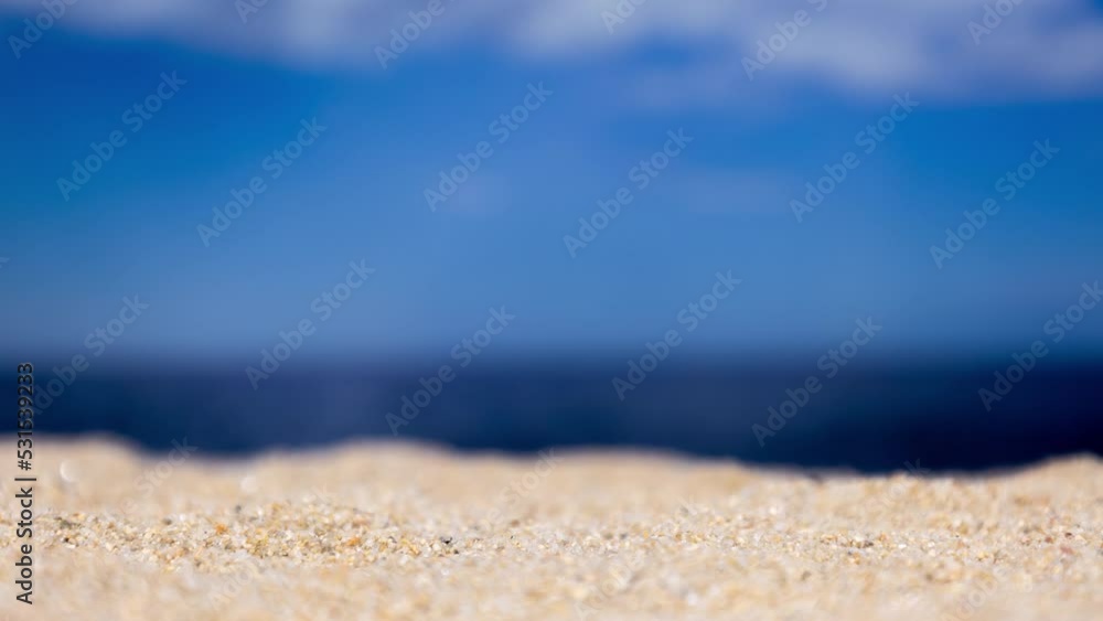 A pair of sunglasses on the beach A pair of sunglasses on the beach