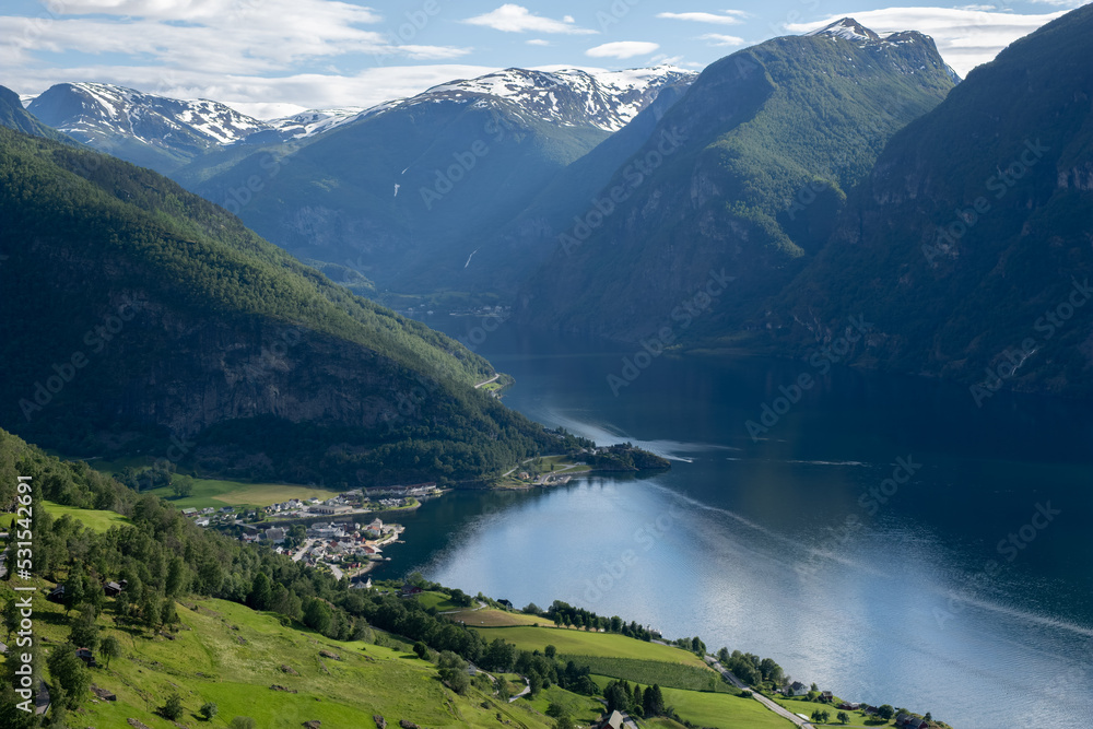 Wonderful landscapes in Norway. Vestland. Beautiful scenery of Aurland fjord from the Aurlandsvangen view point facing to the village of Aurland and Flam. Sunny day. Selective focus